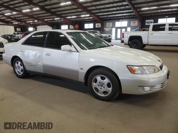 1999 Lexus ES 300 Luxury Sport Sdn with VIN JT8BF28G3X0205731, listed as a Copart auction lot 54057085 with 146,207 mi miles and Salvage Title. Bid and sale history available at carsss.com. Image 4.