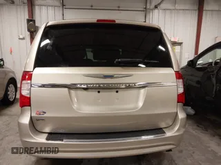 2014 Chrysler Town & Country Touring with VIN 2C4RC1BG3ER295722, listed as a IAAI auction lot 41705820 with 142,587 mi miles and . Bid and sale history available at DreamBid. Image 17.