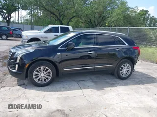 2017 Cadillac XT5 FWD with VIN 1GYKNARS6HZ123114, listed as a IAAI auction lot 41933928 with 166,213 mi miles. Bid and sale history available at carsss.com. Image 14.