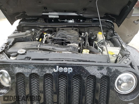 2014 Jeep Wrangler Unlimited Sahara z VIN 1C4HJWEG4EL305998, wystawiony jako Copart lot #56377275 z przebiegiem 60 597 mil mil oraz Szkoda całkowita • Salvage title. Historia ofert i sprzedaży dostępna na DreamBid. Obrazek 12.
