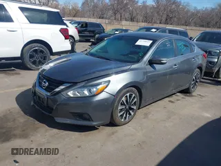 2018 Nissan Altima SR with VIN 1N4AL3AP5JC243138, listed as a IAAI auction lot 41750643 with 123,601 mi miles and . Bid and sale history available at carsss.com. Image 2.
