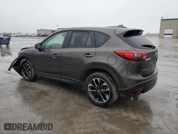2016 Mazda CX-5 Grand Touring with VIN JM3KE2DY4G0811386, listed as a Copart auction lot 51961795 with 99,525 mi miles and Salvage Title. Bid and sale history available at carsss.com. Image 2.