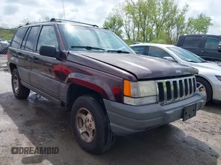 1997 Jeep Grand Cherokee Laredo with VIN 1J4GZ58S4VC702040, listed as a IAAI auction lot 42165536 with 121,803 mi miles and . Bid and sale history available at DreamBid. Image 1.