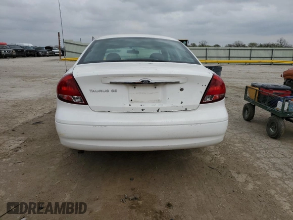 2002 Ford Taurus SE Standard с VIN 1FAFP53U02A133605, выставлен на аукционе Copart как лот 51438315 с пробегом 135 602 миль миль и Списание • Salvage title. История ставок и продаж доступна на DreamBid. Изображение 6.