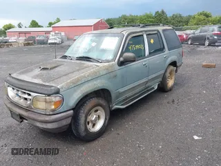 1996 Ford Explorer XL with VIN 1FMDU32X4TZA63759, listed as a IAAI auction lot 42544025 with 254,532 mi miles and . Bid and sale history available at DreamBid. Image 2.