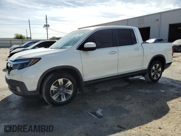 2019 Honda Ridgeline RTL-T with VIN 5FPYK2F62KB002624, listed as a Copart auction lot 50142765 with 62,947 mi miles and Salvage title. Bid and sale history available at DreamBid. Image 1.