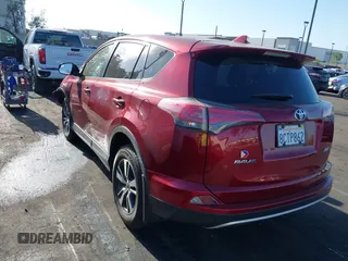 2018 Toyota RAV4 XLE with VIN JTMWFREV6JD117500, listed as a IAAI auction lot 42258588 with Not provided miles and . Bid and sale history available at DreamBid. Image 3.