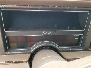 1991 Cadillac Eldorado z VIN 1G6EL13B4MU604636, wystawiony jako Copart lot #79155234 z przebiegiem Nie podano mil oraz Nie do naprawy. Historia ofert i sprzedaży dostępna na DreamBid. Obrazek 9.