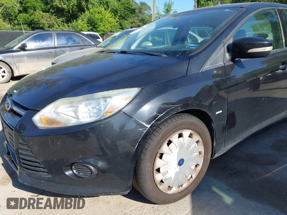 2013 Ford Focus SE z VIN 1FADP3F25DL115727, wystawiony jako IAAI lot #42609895 z przebiegiem 163 749 mil mil oraz . Historia ofert i sprzedaży dostępna na DreamBid. Obrazek 6.