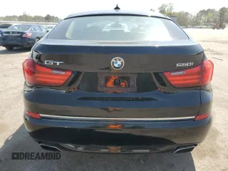 2014 BMW 5 Series GT 550i xDrive with VIN WBA5M0C5XED084908, listed as a Copart auction lot 50619945 with 97,680 mi miles and Salvage Title. Bid and sale history available at carsss.com. Image 6.