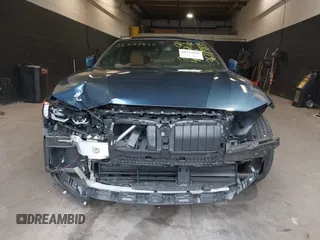 2022 BMW 4 Series 430i xDrive with VIN WBA73AP05NCJ87742, listed as a IAAI auction lot 36773839 with 20,814 mi miles and . Bid and sale history available at carsss.com. Image 12.