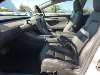 2023 Tesla Model 3 with VIN 5YJ3E1EA3PF610069, listed as a Copart auction lot 50327635 with 19,495 mi miles and Salvage Title. Bid and sale history available at carsss.com. Image 7.