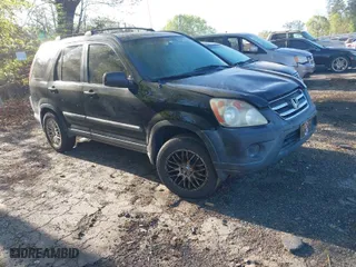 2006 Honda CR-V LX with VIN SHSRD68516U400389, listed as a IAAI auction lot 42005508 with 209,822 mi miles. Bid and sale history available at carsss.com. Image 1.