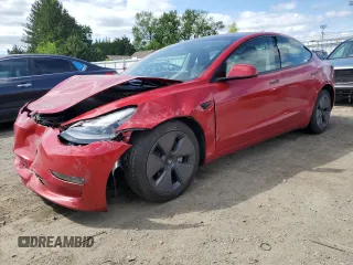 2023 Tesla Model 3 Long Range z VIN 5YJ3E1EB7PF390122, wystawiony jako Copart lot #57094695 z przebiegiem 27 219 mil mil oraz Szkoda całkowita • Salvage title. Historia ofert i sprzedaży dostępna na DreamBid. Obrazek 1.