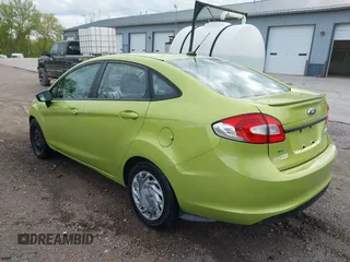 2013 Ford Fiesta SE z VIN 3FADP4BJ9DM184289, wystawiony jako IAAI lot #42110578 z przebiegiem 166 764 mil mil oraz . Historia ofert i sprzedaży dostępna na DreamBid. Obrazek 3.