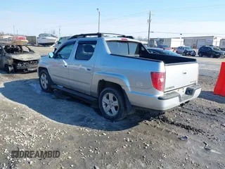 2009 Honda Ridgeline RTL with VIN 2HJYK16569H002832, listed as a IAAI auction lot 41683669 with 154,220 mi miles and . Bid and sale history available at DreamBid. Image 3.
