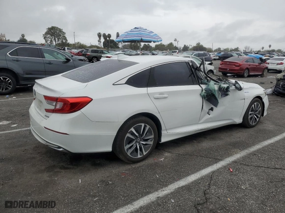 2021 Honda Accord Hybrid with VIN 1HGCV3F12MA007257, listed as a Copart auction lot 43284105 with 56,122 mi miles and Clean Title. Bid and sale history available at carsss.com. Image 3.