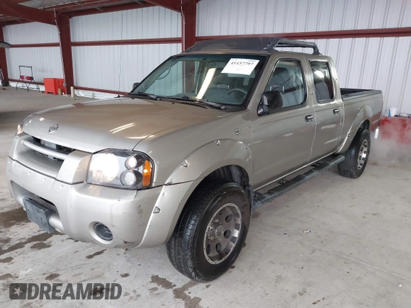 2003 Nissan Frontier SE z VIN 1N6ED29X73C438326, wystawiony jako IAAI lot #41437797 z przebiegiem 309 235 mil mil oraz . Historia ofert i sprzedaży dostępna na DreamBid. Obrazek 2.