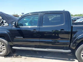 2014 Toyota Tacoma PreRunner with VIN 3TMJU4GN0EM160403, listed as a IAAI auction lot 41979894 with 169,941 mi miles. Bid and sale history available at carsss.com. Image 14.