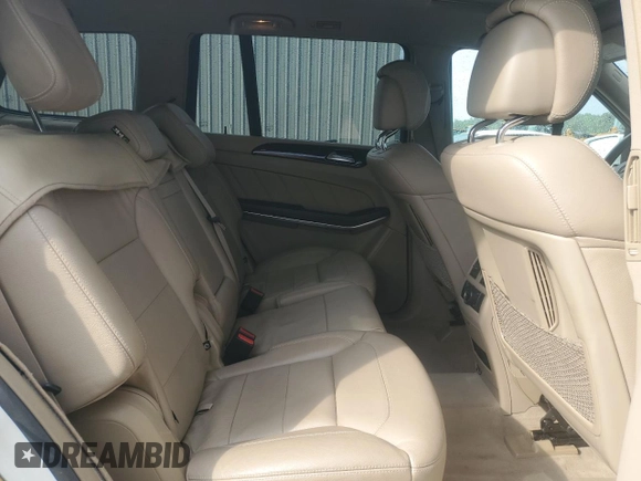 2014 Mercedes-Benz GL 450 z VIN 4JGDF7CE5EA434847, wystawiony jako Copart lot #53893475 z przebiegiem 117 808 mil mil oraz Szkody całkowita. Historia ofert i sprzedaży dostępna na DreamBid. Obrazek 10.