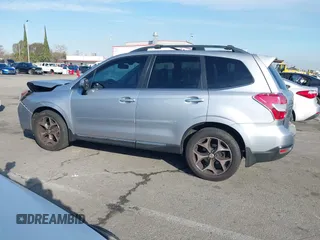 2016 Subaru Forester 2.0XT Touring with VIN JF2SJGXC7GH542997, listed as a IAAI auction lot 41528902 with 116,862 mi miles. Bid and sale history available at carsss.com. Image 14.