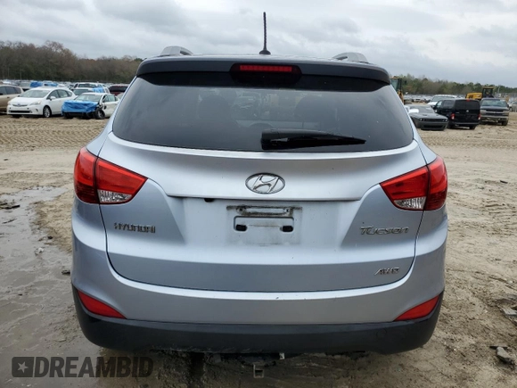 2011 Hyundai Tucson Limited with VIN KM8JUCAC8BU196358, listed as a Copart auction lot 51111975 with 200,439 mi miles and Salvage Title. Bid and sale history available at DreamBid. Image 6.