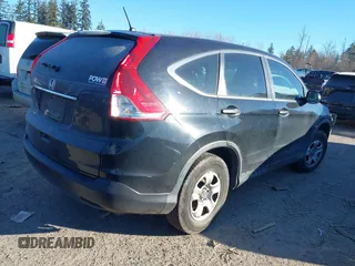 2014 Honda CR-V LX with VIN 3CZRM3H33EG701074, listed as a IAAI auction lot 41533756 with 127,928 mi miles. Bid and sale history available at carsss.com. Image 4.