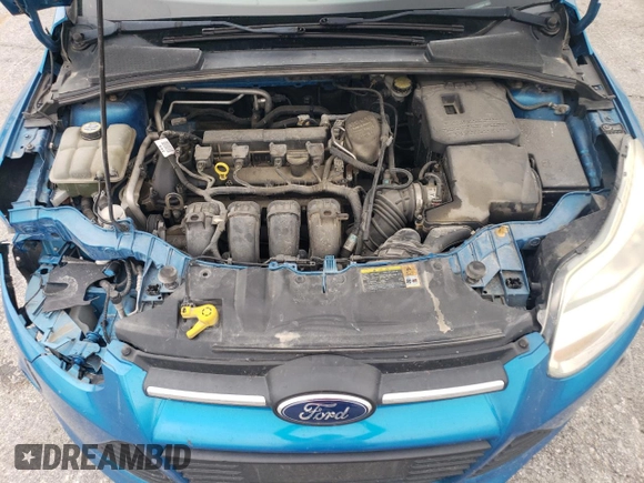 2012 Ford Focus SE z VIN 1FAHP3F22CL267562, wystawiony jako Copart lot #53556895 z przebiegiem 179 828 mil mil oraz Szkoda całkowita • Salvage title. Historia ofert i sprzedaży dostępna na DreamBid. Obrazek 11.