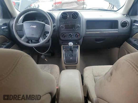 2009 Jeep Patriot Sport z VIN 1J4FT28B39D147223, wystawiony jako Copart lot #53913695 z przebiegiem 132 432 mil mil oraz Szkoda całkowita • Salvage title. Historia ofert i sprzedaży dostępna na DreamBid. Obrazek 8.