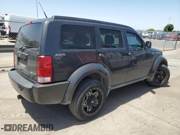 2011 Dodge Nitro Heat with VIN 1D4PU4GK7BW546475, listed as a Copart auction lot 57531065 with 157,935 mi miles and Salvage title. Bid and sale history available at DreamBid. Image 3.