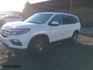 2016 Honda Pilot EX with VIN 5FNYF6H39GB003266, listed as a IAAI auction lot 40682948 with 155,569 mi miles. Bid and sale history available at carsss.com. Image 2.