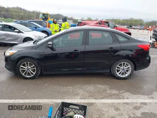 2016 Ford Focus SE with VIN 1FADP3F29GL356629, listed as a IAAI auction lot 41946558 with 86,430 mi miles and . Bid and sale history available at DreamBid. Image 14.