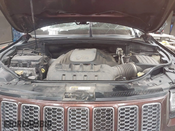2014 Jeep Grand Cherokee Summit with VIN 1C4RJFJT6EC346575, listed as a IAAI auction lot 41881795 with 148,941 mi miles and . Bid and sale history available at DreamBid. Image 10.