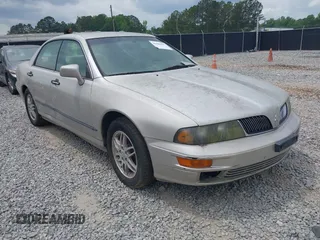2002 Mitsubishi Diamante LS z VIN 6MMAP57P52T010479, wystawiony jako IAAI lot #42086895 z przebiegiem 89 977 mil mil oraz . Historia ofert i sprzedaży dostępna na DreamBid. Obrazek 1.