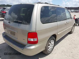 2005 Kia Sedona LX with VIN KNDUP131756627998, listed as a IAAI auction lot 42058213 with 152,433 mi miles. Bid and sale history available at carsss.com. Image 4.