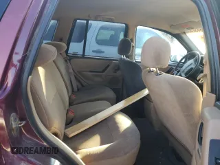 1999 Jeep Grand Cherokee Laredo with VIN 1J4GW58SXXC706962, listed as a Copart auction lot 88325515 with Not provided miles and Clean title. Bid and sale history available at DreamBid. Image 11.