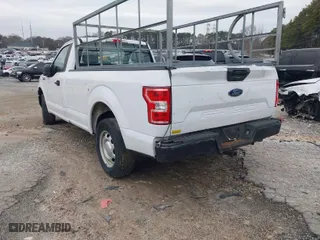 2019 Ford F-150 XL with VIN 1FTMF1CB1KKC54875, listed as a IAAI auction lot 41526335 with 148,810 mi miles. Bid and sale history available at carsss.com. Image 3.