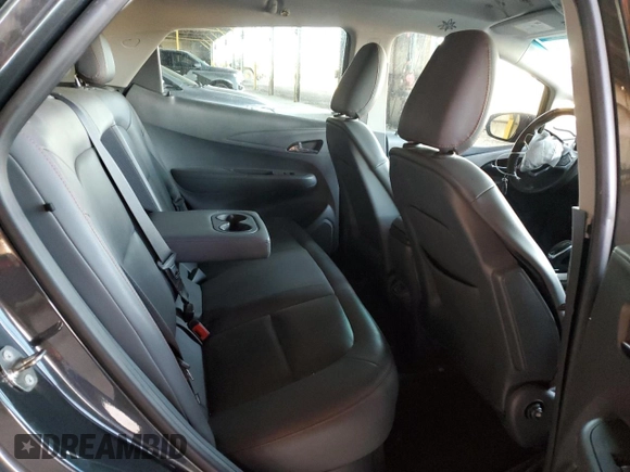 2018 Chevrolet Bolt EV Premier z VIN 1G1FX6S03J4114826, wystawiony jako Copart lot #57649515 z przebiegiem 136 670 mil mil oraz Szkoda całkowita • Salvage title. Historia ofert i sprzedaży dostępna na DreamBid. Obrazek 10.