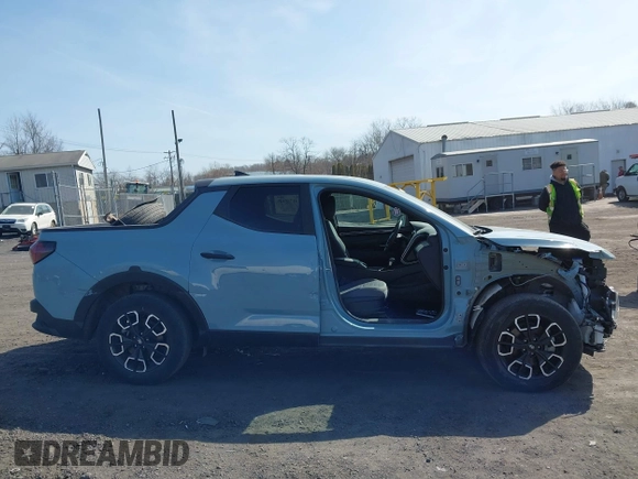 2024 Hyundai Santa Cruz SEL z VIN 5NTJBDAE3RH088530, wystawiony jako IAAI lot #41785149 z przebiegiem 21 560 mil mil oraz . Historia ofert i sprzedaży dostępna na DreamBid. Obrazek 13.