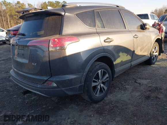 2018 Toyota RAV4 XLE z VIN 2T3WFREV6JW503353, wystawiony jako IAAI lot #41641002 z przebiegiem 54 013 mil mil oraz . Historia ofert i sprzedaży dostępna na DreamBid. Obrazek 4.