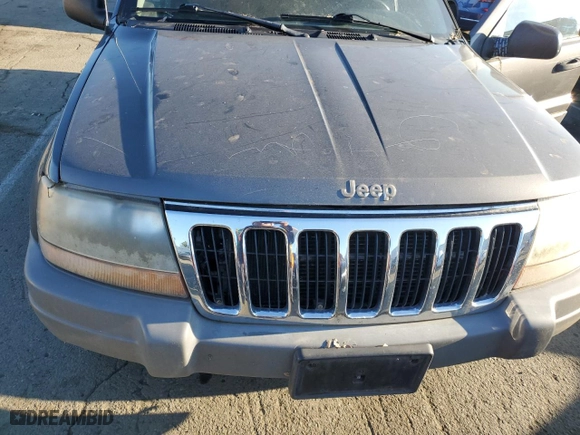 2002 Jeep Grand Cherokee Laredo with VIN 1J4GW48N32C200645, listed as a Copart auction lot 88174715 with 112,129 mi miles and Clean Title. Bid and sale history available at carsss.com. Image 12.