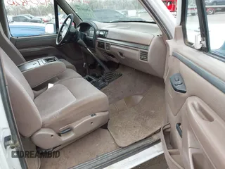 1995 Ford F-150 with VIN 1FTEX14N8SKB20438, listed as a IAAI auction lot 42048210 with 151,107 mi miles. Bid and sale history available at carsss.com. Image 5.