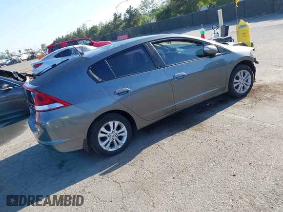 2012 Honda Insight EX z VIN JHMZE2H77CS001370, wystawiony jako IAAI lot #42312077 z przebiegiem 134 249 mil mil oraz . Historia ofert i sprzedaży dostępna na DreamBid. Obrazek 4.