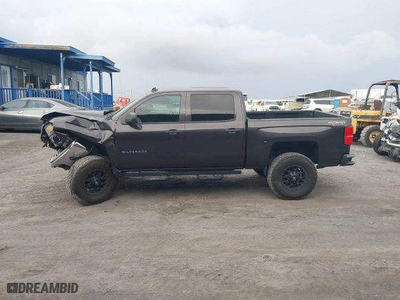 2014 Chevrolet Silverado 1500 LT with VIN 3GCUKREH4EG427604, listed as a IAAI auction lot 41403243 with 133,467 mi miles. Bid and sale history available at carsss.com. Image 14.