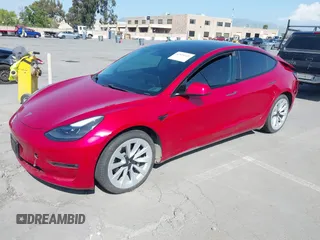 2021 Tesla Model 3 Long Range with VIN 5YJ3E1EB4MF936743, listed as a IAAI auction lot 42154322 with 46,983 mi miles and . Bid and sale history available at DreamBid. Image 2.