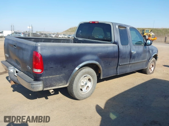 1999 Ford F-150 with VIN 2FTRX17L8XCB23329, listed as a IAAI auction lot 41448347 with 223,517 mi miles and . Bid and sale history available at DreamBid. Image 4.