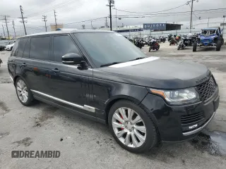 2014 Land Rover Range Rover Supercharged with VIN SALGS3TF0EA165129, listed as a Copart auction lot 50652275 with 121,131 mi miles and Salvage title. Bid and sale history available at DreamBid. Image 4.
