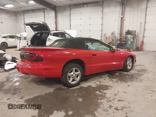 1997 Pontiac Firebird with VIN 2G2FS32K0V2225422, listed as a IAAI auction lot 41360837 with 1 mi miles. Bid and sale history available at carsss.com. Image 4.