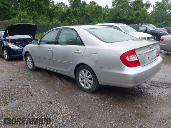 2002 Toyota Camry XLE z VIN JTDBF30K420083381, wystawiony jako IAAI lot #42368073 z przebiegiem 148 746 mil mil oraz . Historia ofert i sprzedaży dostępna na DreamBid. Obrazek 3.