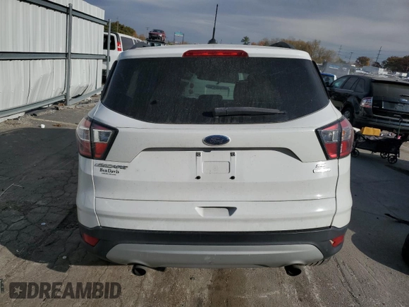 2018 Ford Escape SE with VIN 1FMCU0G96JUC41704, listed as a Copart auction lot 77678304 with 0 mi miles and Salvage Title. Bid and sale history available at carsss.com. Image 6.